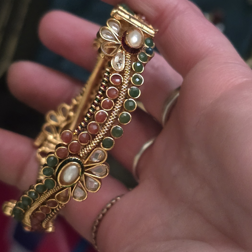 Elegant Gold and Green Bracelet